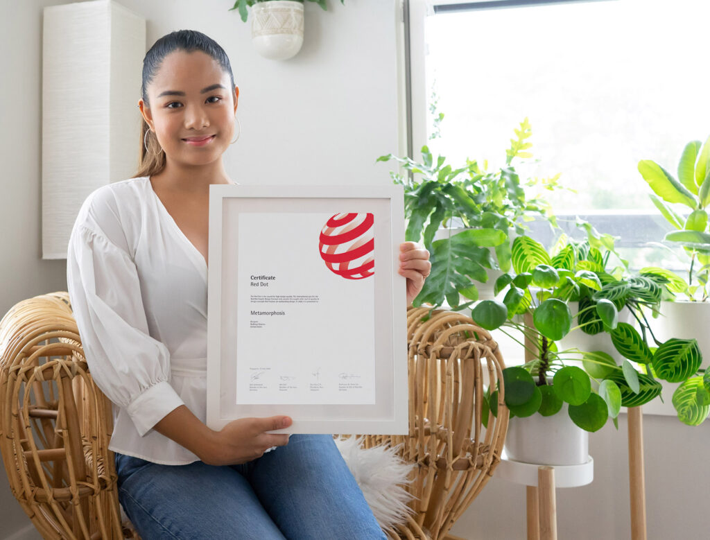 Radheya Visperas Ponce With Her Red Dot Award Certificated 2