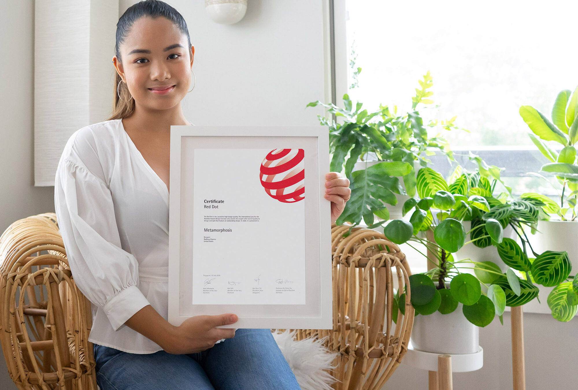 Radheya Visperas Ponce With Her Red Dot Award Certificated 2