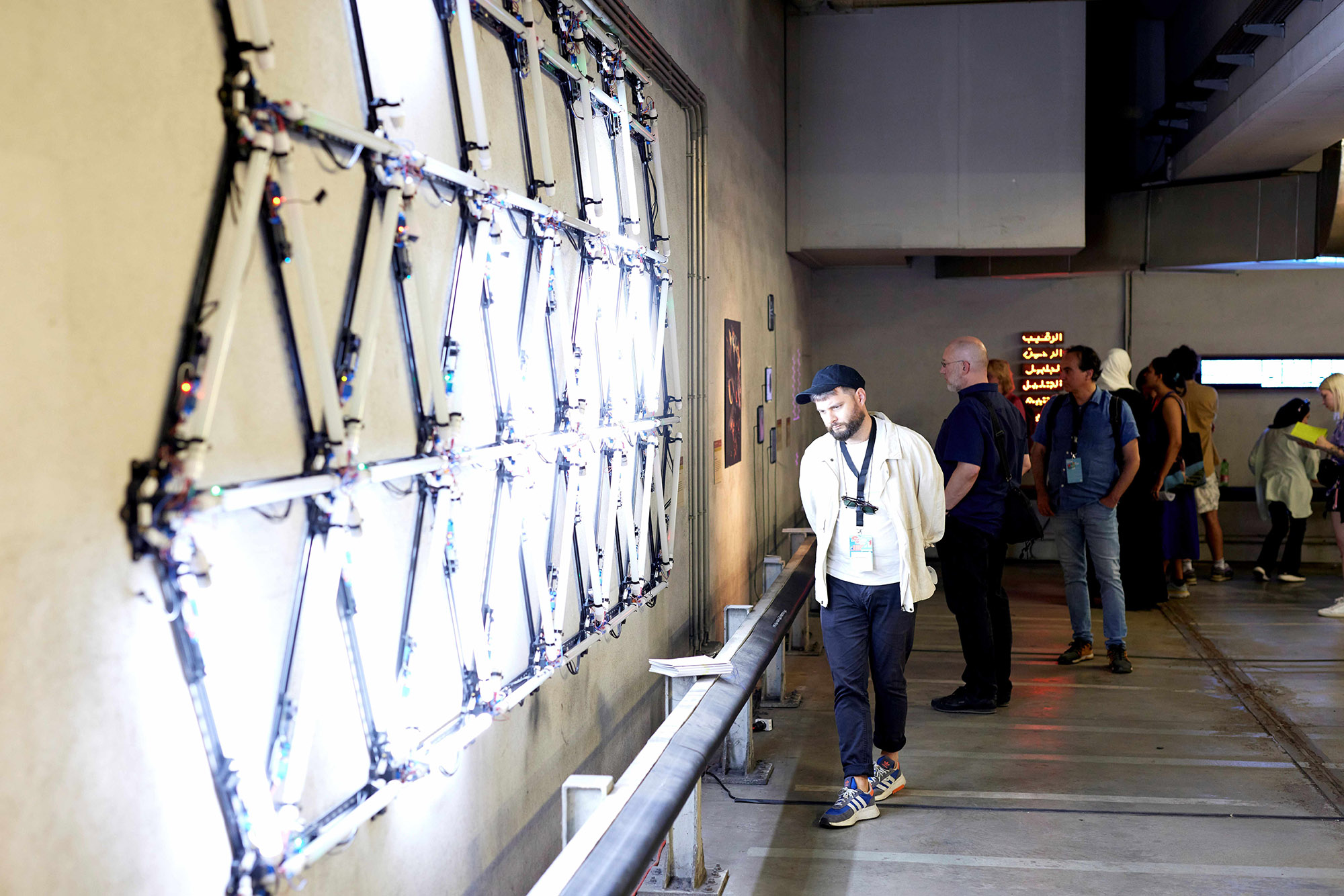 Visitors viewing the X lab light installation at ars electronica