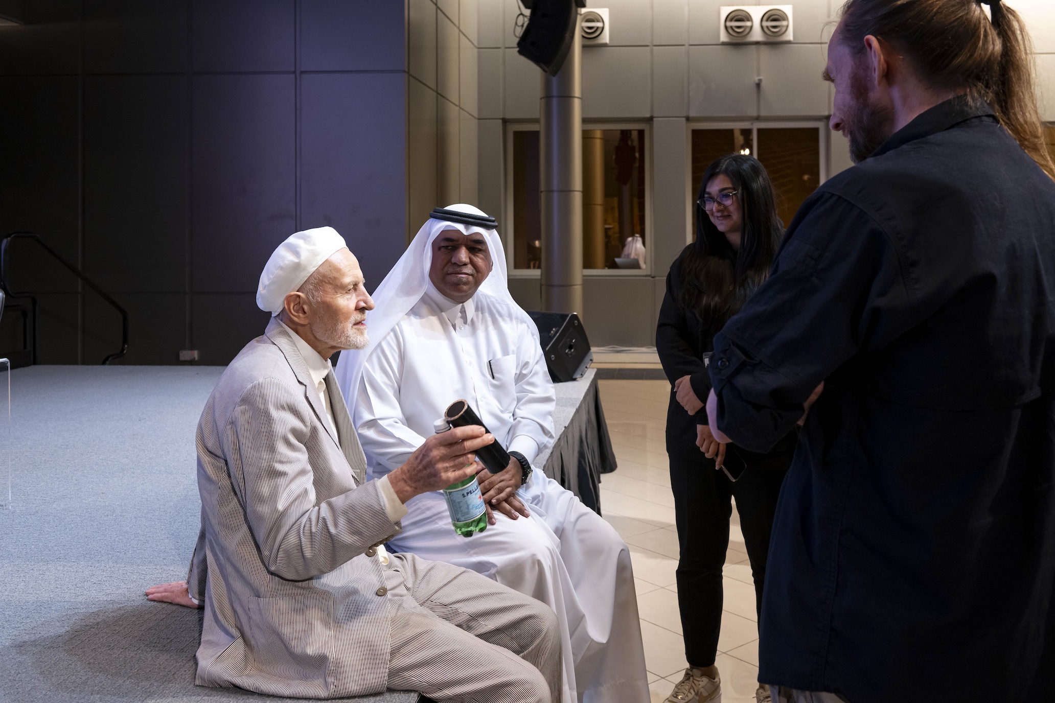 Peter Sanders talking to Khalifa Al Obaidly and Sarah Faheem