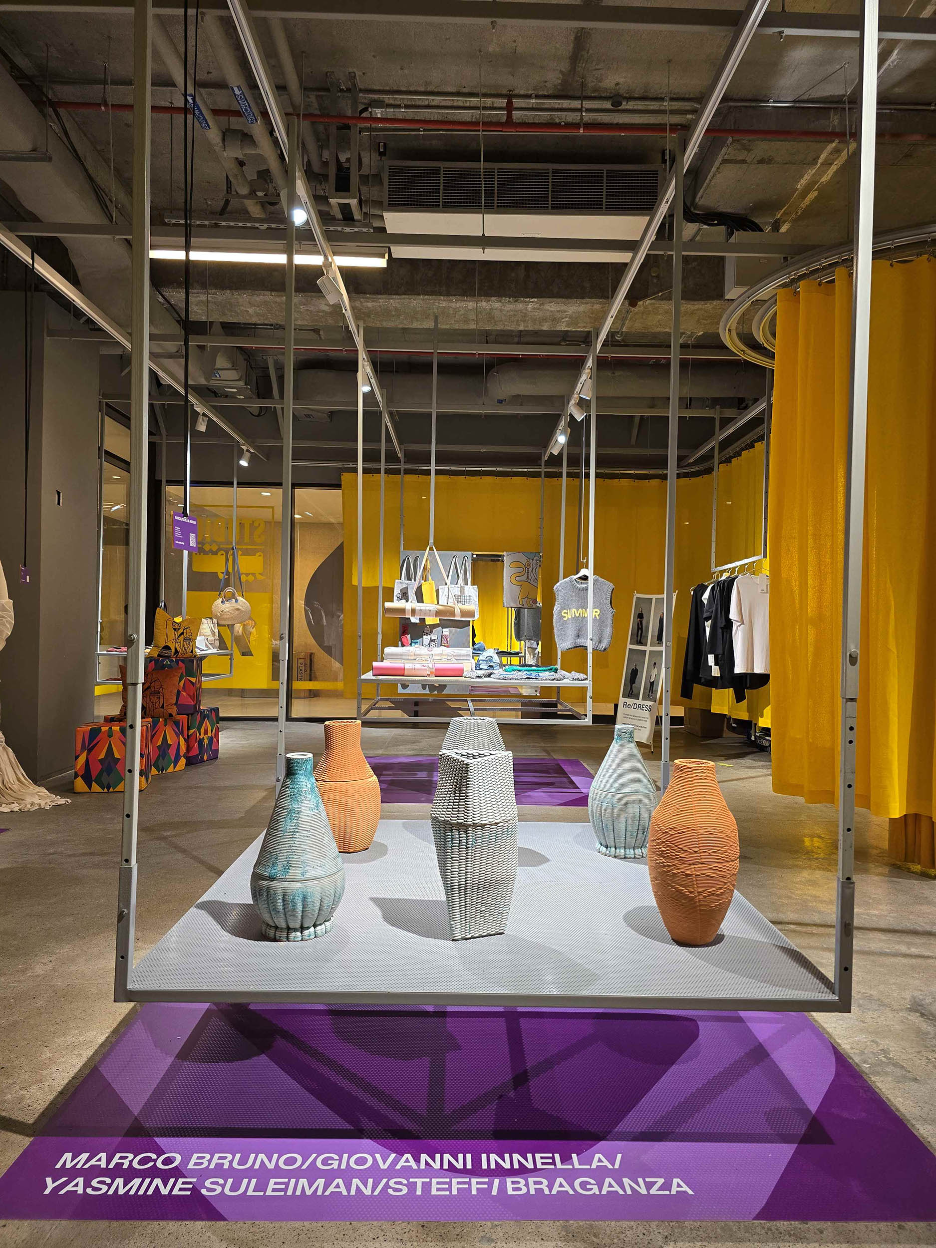v c u arts qatar project showing 3 d printed earthen ware vases on display at m 7 during the biennale 
