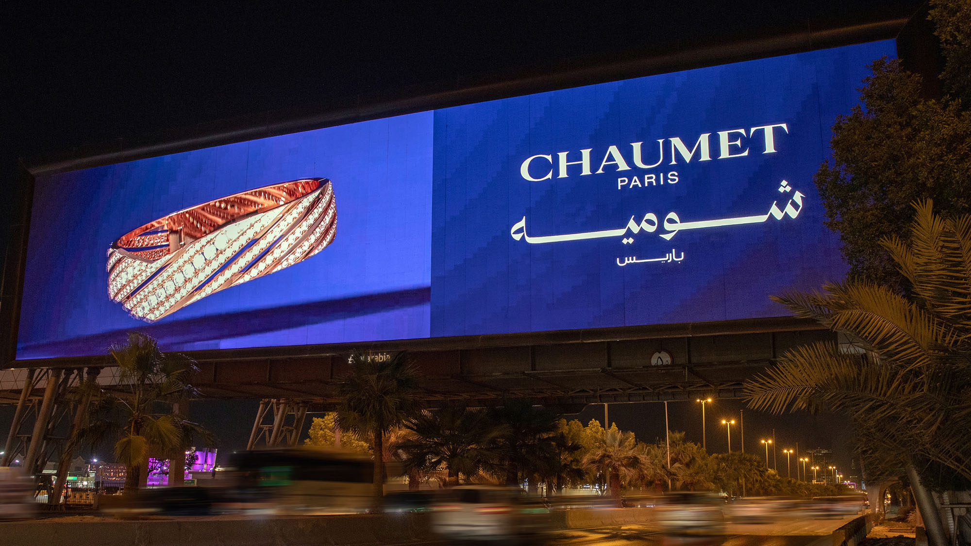 Chaumet Sign With A Photo Of A Jewelled Wristband Above A Highway