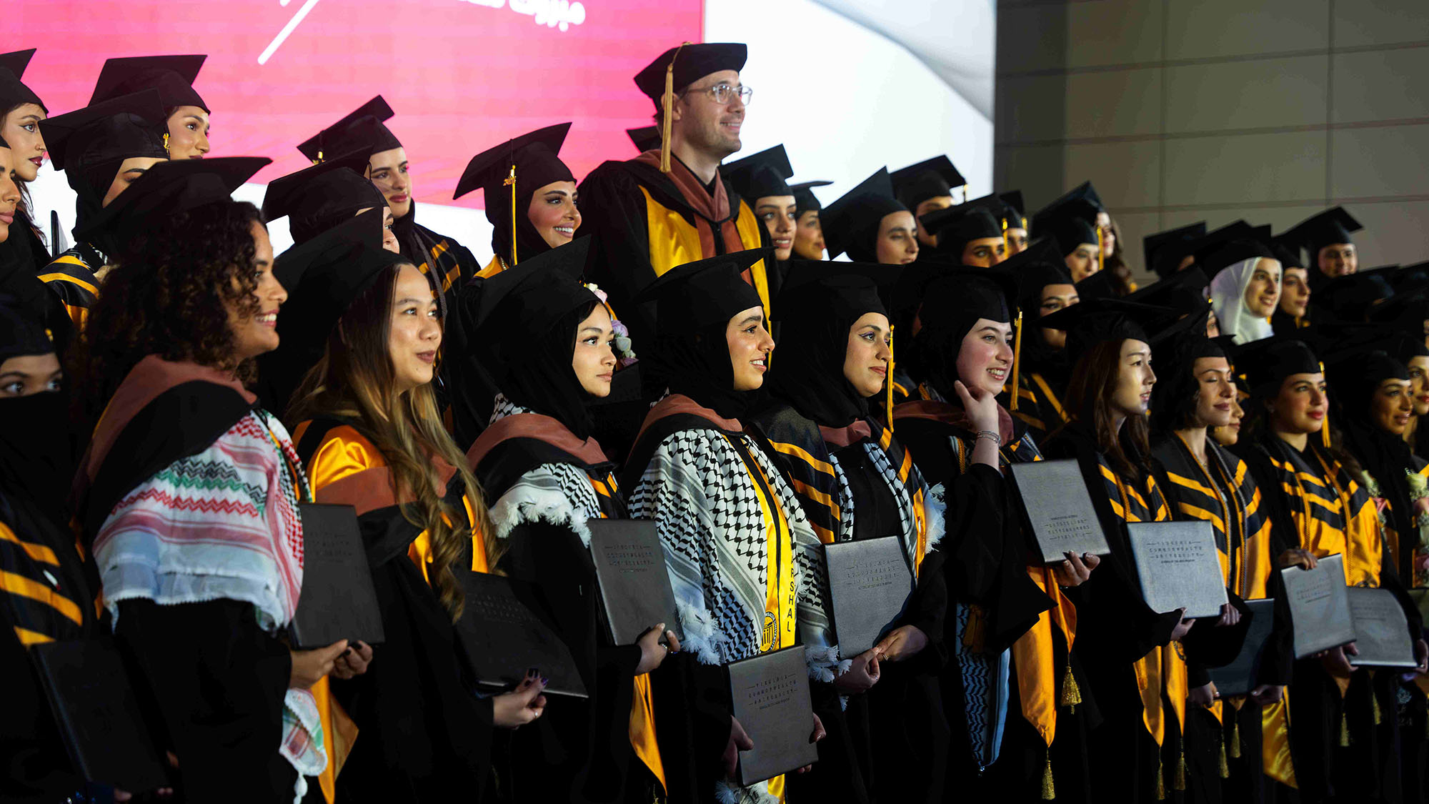 class of 20 24 students lining up for the group photo at the Commencement 